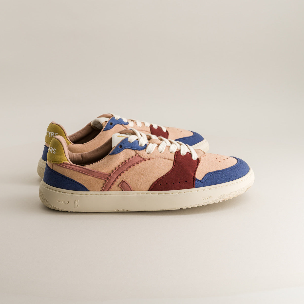 Multicolored barefoot sneakers on a light gray background