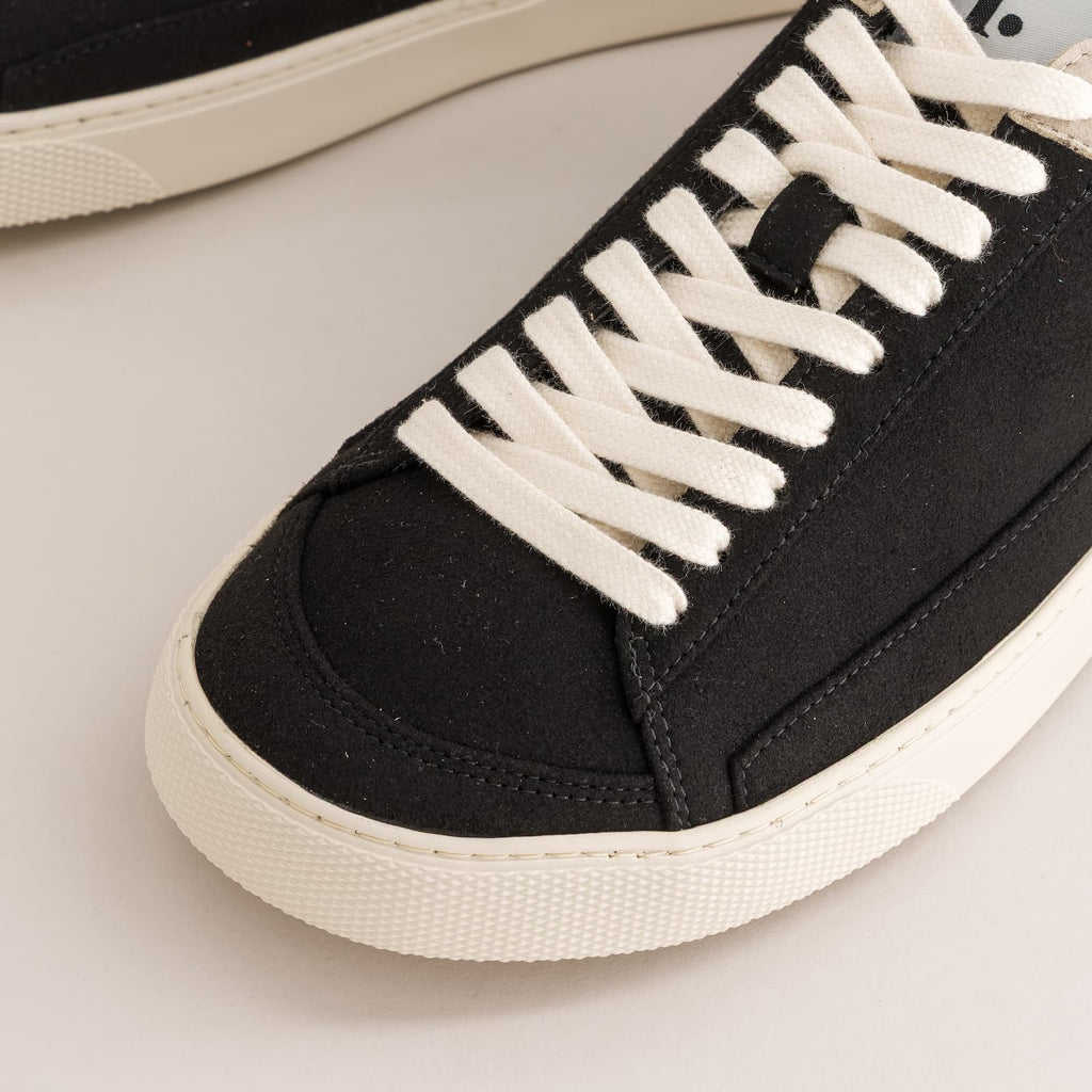 details of a black barefoot sneaker - wide toe box